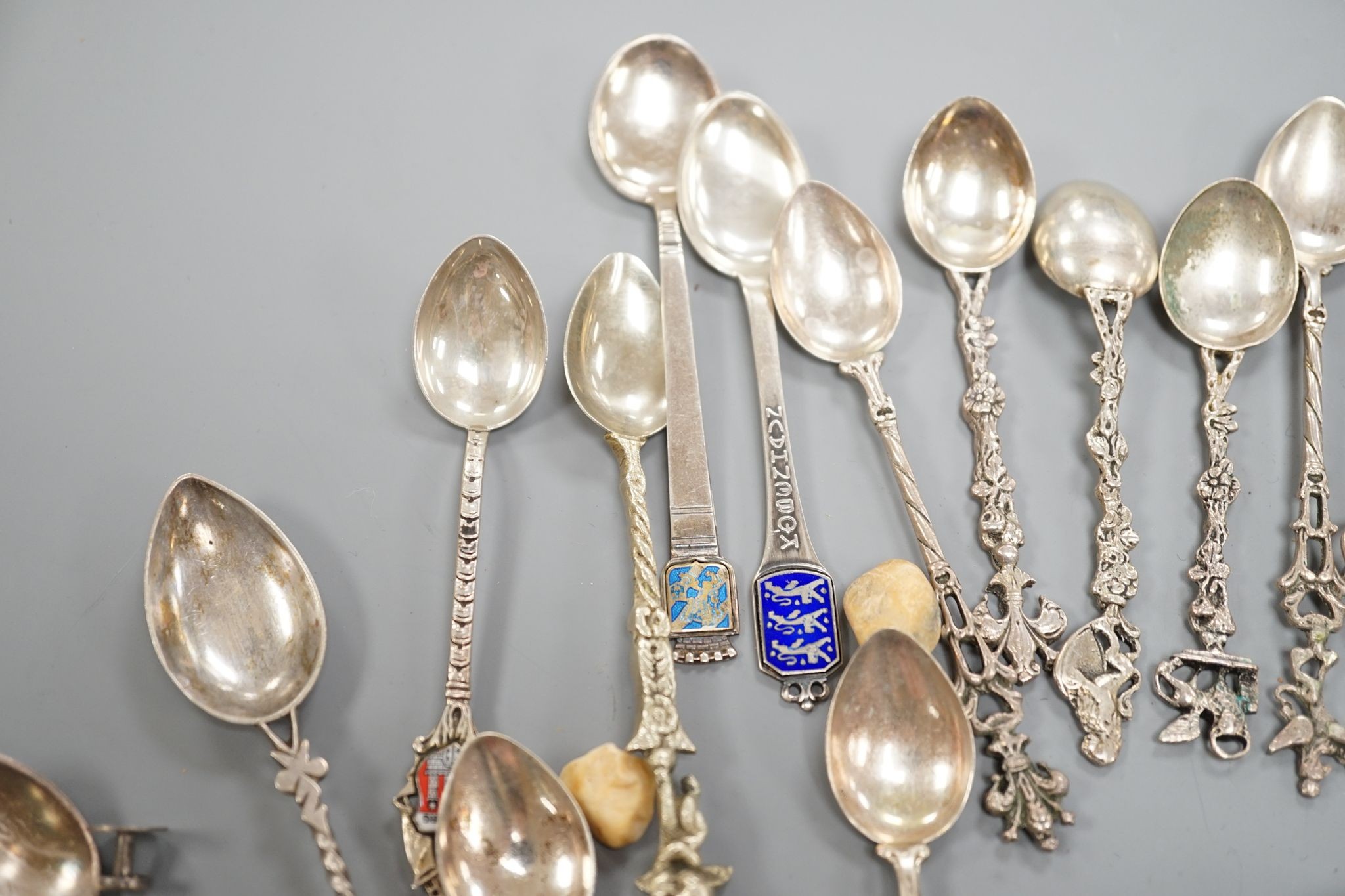 A Georg Jensen & Wendel A/S sterling small spoon, 10.2cm, a pair of antique silver sugar tongs(a.f.), a metal snuff box and a small group of minor spoons including continental white metal.